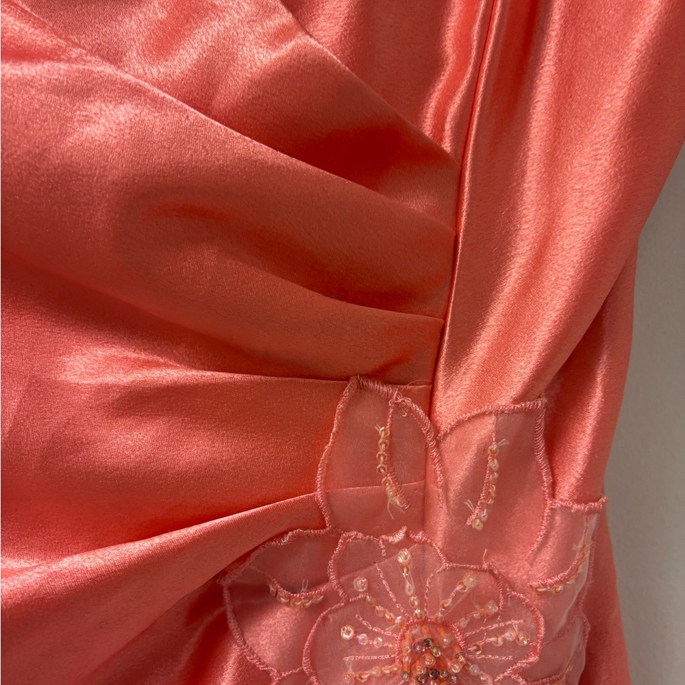 Jessica McClintock Asymmetrical Coral Dress with Floral Accent - Picture 4 of 10